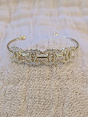 Gold-Tone White Logo Link Open Cuff Bracelet